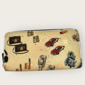 LOUIS VUITTON Monogram Vernis Nicolas Ghesquire Zippy Wallet - color transfer